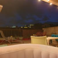 Balkon lub taras w obiekcie Maison intra muros, terrasses avec vue jaccuzzi et garage