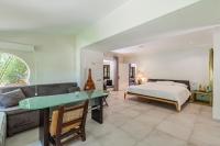Łóżko lub łóżka w pokoju w obiekcie Villa Hacienda del Mar