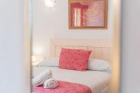 A bed or beds in a room at Ca Na Pepa