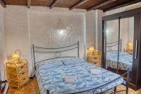 A bed or beds in a room at Villetta Rustica