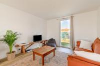 Televízia a/alebo spoločenská miestnosť v ubytovaní Maison moderne pour 5 personnes à Noirmoutier