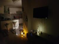 TV a/nebo společenská místnost v ubytování Apartment Haut standing Panamera Residence Khezema Sousse