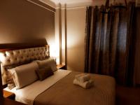 Posteľ alebo postele v izbe v ubytovaní Cozy Apartment in the Heart of Thessaloniki