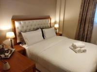 Posteľ alebo postele v izbe v ubytovaní Cozy Apartment in the Heart of Thessaloniki