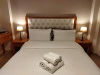 Posteľ alebo postele v izbe v ubytovaní Cozy Apartment in the Heart of Thessaloniki