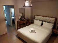 Posteľ alebo postele v izbe v ubytovaní Cozy Apartment in the Heart of Thessaloniki