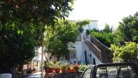 A garden outside Traditional house in Akamatra square