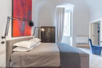 A bed or beds in a room at Dimora Bormioli
