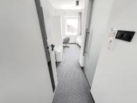 Televízia a/alebo spoločenská miestnosť v ubytovaní Bell's Hotel