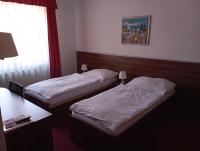 Posteľ alebo postele v izbe v ubytovaní Hotel Barbakan