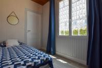 Posteľ alebo postele v izbe v ubytovaní Maison de la plage, charme et soleil