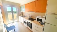 Kuchyň nebo kuchyňský kout v ubytování Cabanas Gardens-T1 PH Apartment WPCG 55