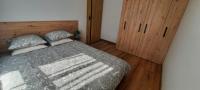 Posteľ alebo postele v izbe v ubytovaní Asti Apartamenty Centrum Stargard