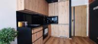 Kuchyňa alebo kuchynka v ubytovaní Asti Apartamenty Centrum Stargard