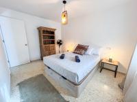 Postel nebo postele na pokoji v ubytování Tarifa Cozy House - La Casita del Recreo