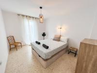 Postel nebo postele na pokoji v ubytování Tarifa Cozy House - La Casita del Recreo