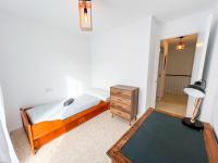 Postel nebo postele na pokoji v ubytování Tarifa Cozy House - La Casita del Recreo