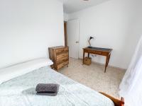 Postel nebo postele na pokoji v ubytování Tarifa Cozy House - La Casita del Recreo