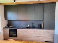 Een keuken of kitchenette bij Alpenblick Apartment