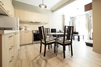 Kuchyňa alebo kuchynka v ubytovaní Delmare MQUEEN Apartment
