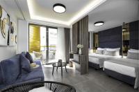 Posteľ alebo postele v izbe v ubytovaní Evitel Luxury Living