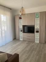 Televízia a/alebo spoločenská miestnosť v ubytovaní Casa Belinda