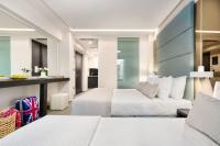 Posteľ alebo postele v izbe v ubytovaní Evitel Luxury Living