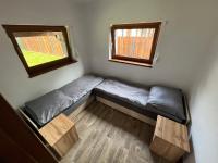 Posteľ alebo postele v izbe v ubytovaní Domek -Radawa-Królewska 77b,domek Dorota