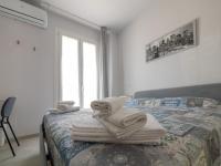 Posteľ alebo postele v izbe v ubytovaní Camere Casa Azzurra