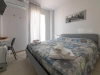 Posteľ alebo postele v izbe v ubytovaní Camere Casa Azzurra
