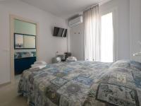 Posteľ alebo postele v izbe v ubytovaní Camere Casa Azzurra