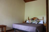 Postel nebo postele na pokoji v ubytování Casa Teresina