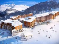 a group of people in the snow at a resort at Appartement Les Arcs 1800, 2 pièces, 4 personnes - FR-1-346-318 in Arc 1800