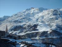 a mountain with snow on it with a town and buildings at Appartement Les Menuires, 2 pièces, 5 personnes - FR-1-344-855 in Les Menuires