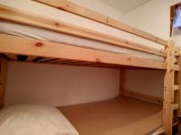 Ein Etagenbett oder Etagenbetten in einem Zimmer der Unterkunft Studio Les Menuires, 1 pi&egrave;ce, 4 personnes - FR-1-344-903