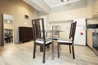 Kuchyňa alebo kuchynka v ubytovaní Delmare MQUEEN Apartment