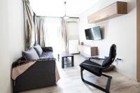 Televízia a/alebo spoločenská miestnosť v ubytovaní Delmare MQUEEN Apartment