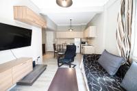 Kuchyňa alebo kuchynka v ubytovaní Delmare MQUEEN Apartment