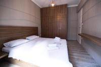 Posteľ alebo postele v izbe v ubytovaní Delmare MQUEEN Apartment