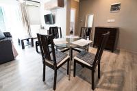 Televízia a/alebo spoločenská miestnosť v ubytovaní Delmare MQUEEN Apartment