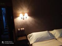 A bed or beds in a room at Casa Puertas