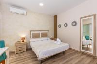 Posteľ alebo postele v izbe v ubytovaní Apartamentos Lola Beach