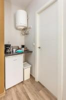 Kuchyňa alebo kuchynka v ubytovaní Apartamentos Lola Beach