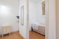 A bed or beds in a room at Arbor Exclusive B&B