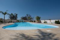 The swimming pool at or close to Arbor Exclusive B&B