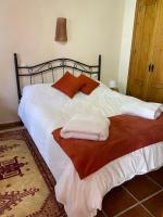 Postel nebo postele na pokoji v ubytování Villa Laguneta