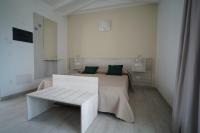 Posteľ alebo postele v izbe v ubytovaní Villa Lentischio