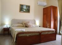 Posteľ alebo postele v izbe v ubytovaní Il Belvedere vicino Taormina