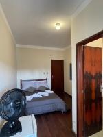 Hotel Chão Mineiroにあるベッド