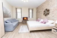 A bed or beds in a room at Comfortable romantic 1 bedroom apartment near Augarten